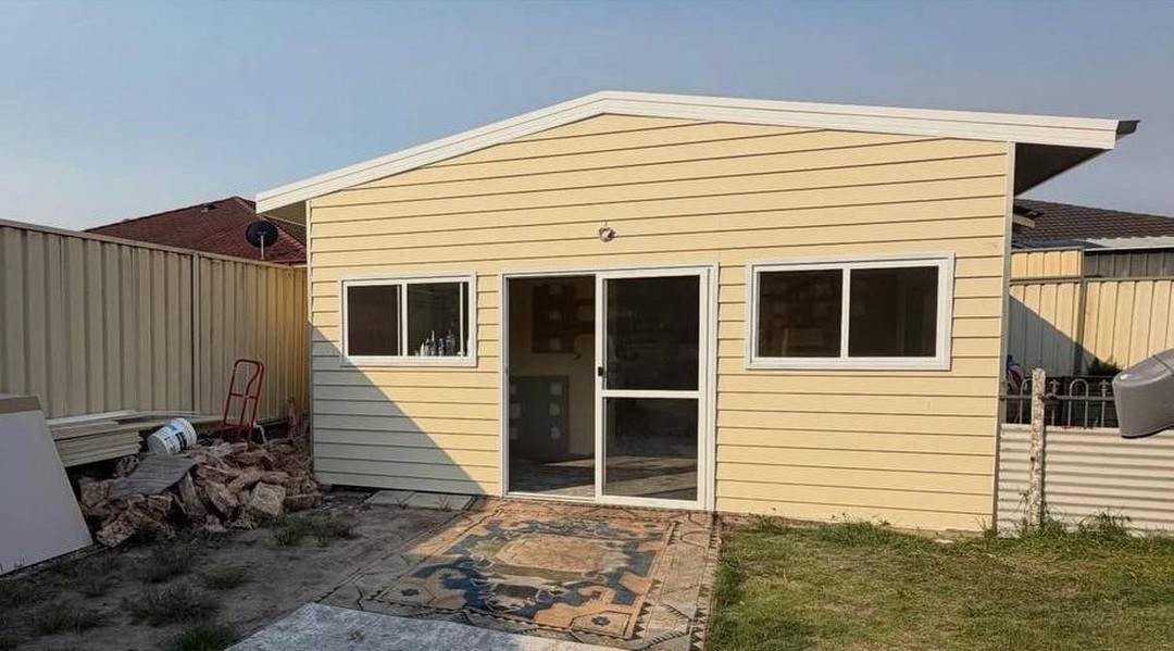 Converted garage — finished weatherboard granny flat — MWD Carpentry